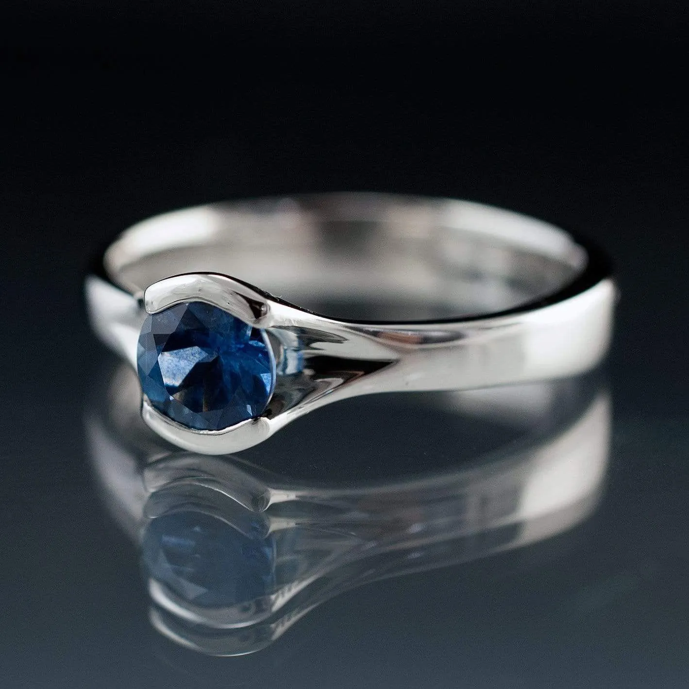 Round Fair Trade Blue Sapphire Fold Solitaire Engagement Ring